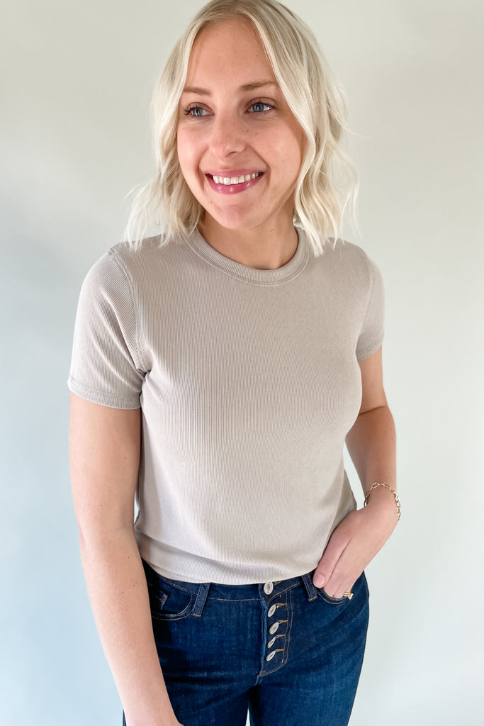 The Mae Short Sleeve Ribbed Tee is an amazing basic to have. It is better than an average shirt and has subtle details we love. The top has a ribbed fabric, which smooths the body and looks so chic. It comes in a few colors and pairs with everything too!