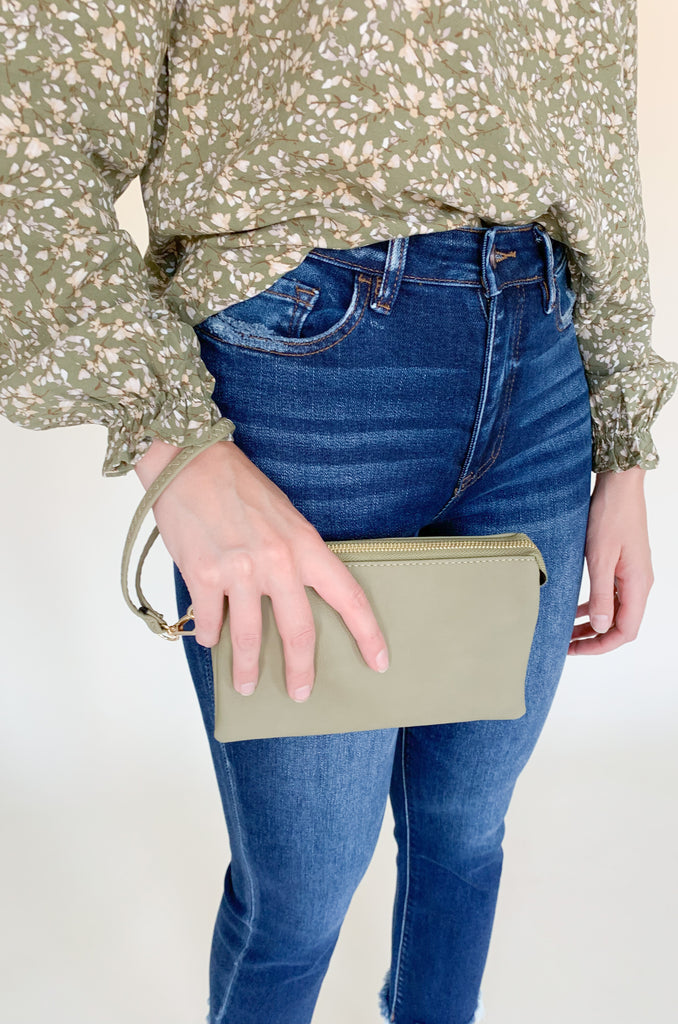 The Miley Crossbody/Wristlet bag is perfect for on-the-go! It can be work 6 ways. Wear it as a crossbody bag, wristlet, clutch, shoulder bag, sling bag, or as a belt bag! Pair it with one of our Fabric Guitar Straps as pictured for that sling bag look. We love the versatility and all the colors.