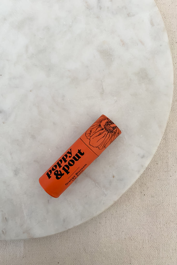 The Poppy and Pout Lip Balm is not your average lip balm. Each flavor has a subtle, sweet scent and is 100% natural. The Organic Coconut Oil, Ethically Sourced Beeswax, and Vitamin E infused in each balm will keep your lips hydrated for hours!