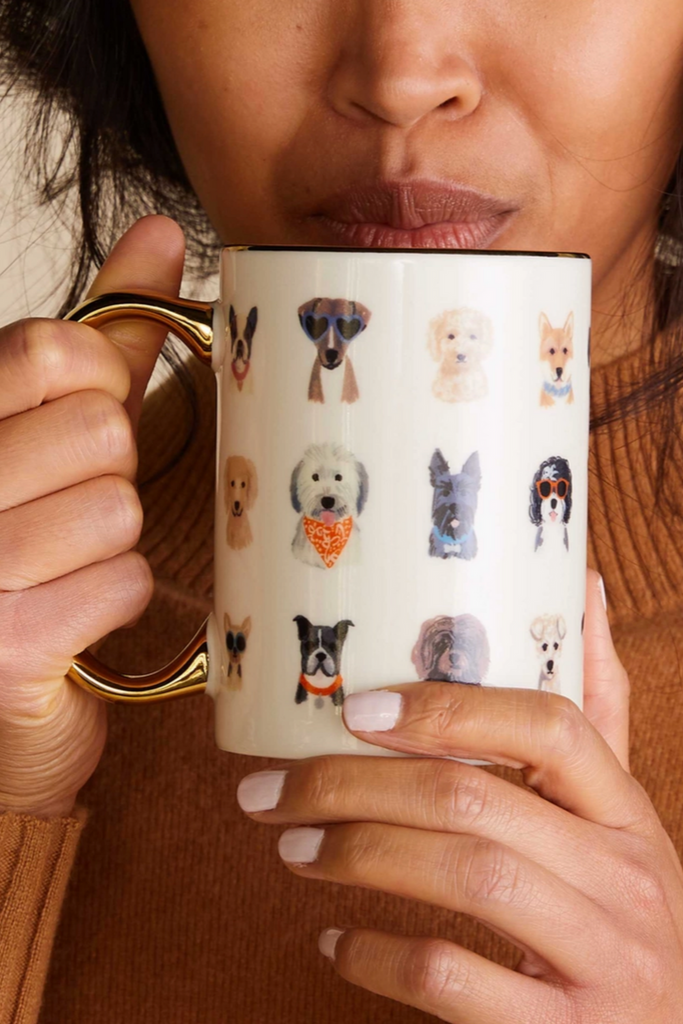 Settle in with a warm drink and a good book with our Book Club mug, featuring our favorite classic titles. Our porcelain mugs feature illustrated designs and a gilded rim and handle to add a little something special to your favorite beverage