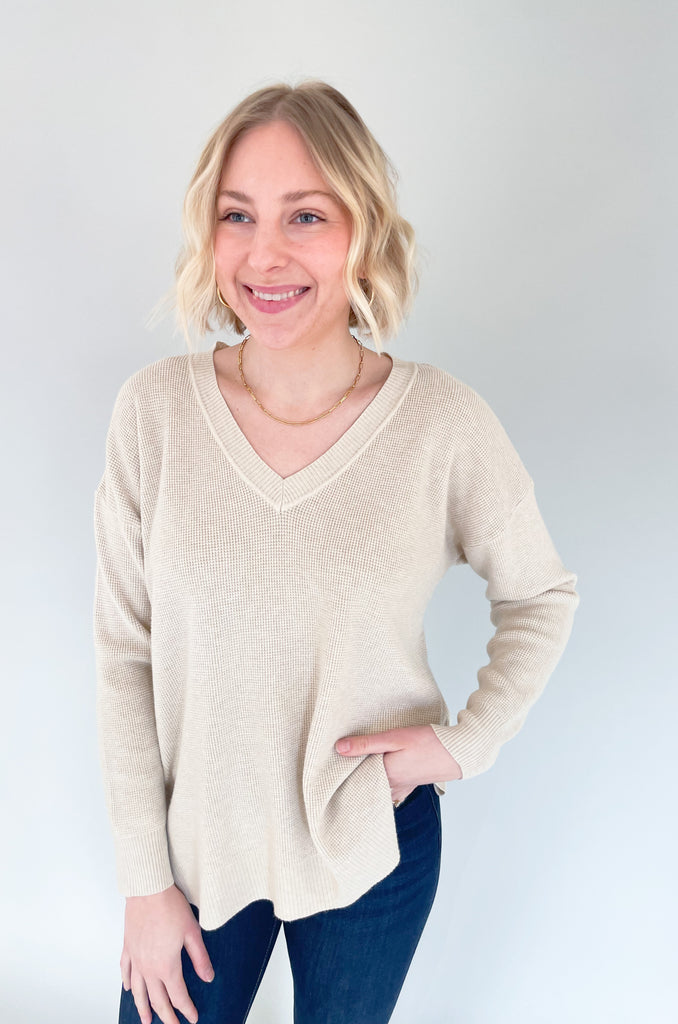 The Renee V Neck Waffle Knit Sweater comes in the BEST colors and has a dreamy fabric. It might look simple, but once you put it on, you will fall in love! It's buttery soft, stretchy, and has a generous silhouette. The texture is elevated too. 