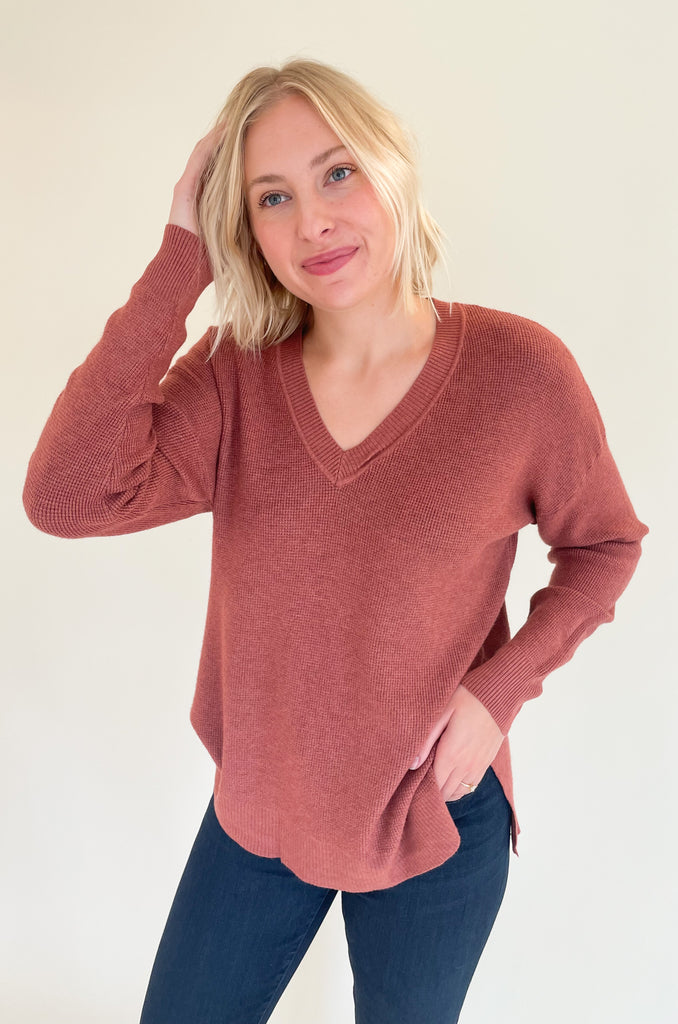 The Renee V Neck Waffle Knit Sweater comes in the BEST colors and has a dreamy fabric. It might look simple, but once you put it on, you will fall in love! It's buttery soft, stretchy, and has a generous silhouette. The texture is elevated too. 