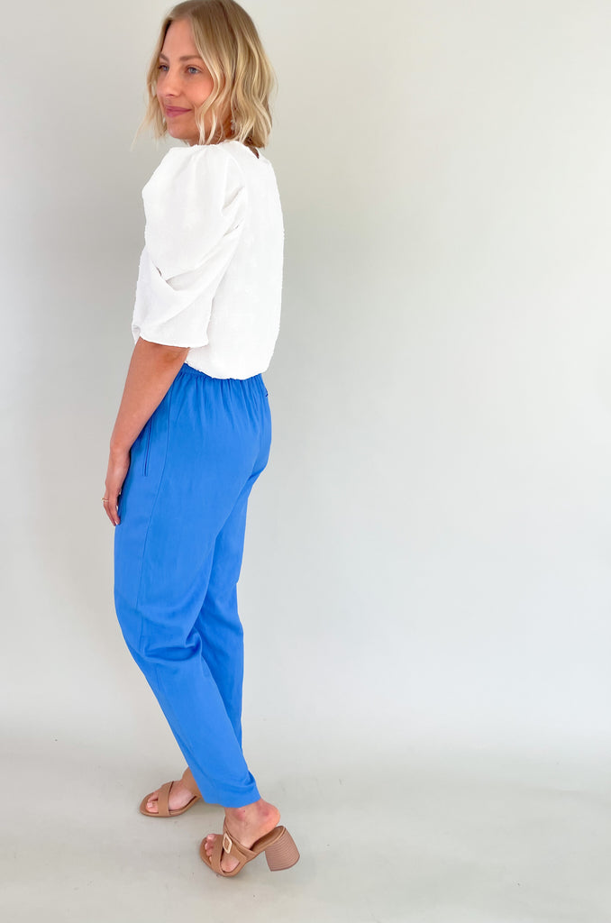 Get ready to turn heads in these show-stopping, vibrant blue Woven Front Pleated Pants. They are an easy way to add a unique touch to a basic outfit. You can dress them up with a blouse, or wear them casually with a solid tank or tee. Crafted with high-quality materials, these pants are durable, breathable, and comfortable to wear all day long.