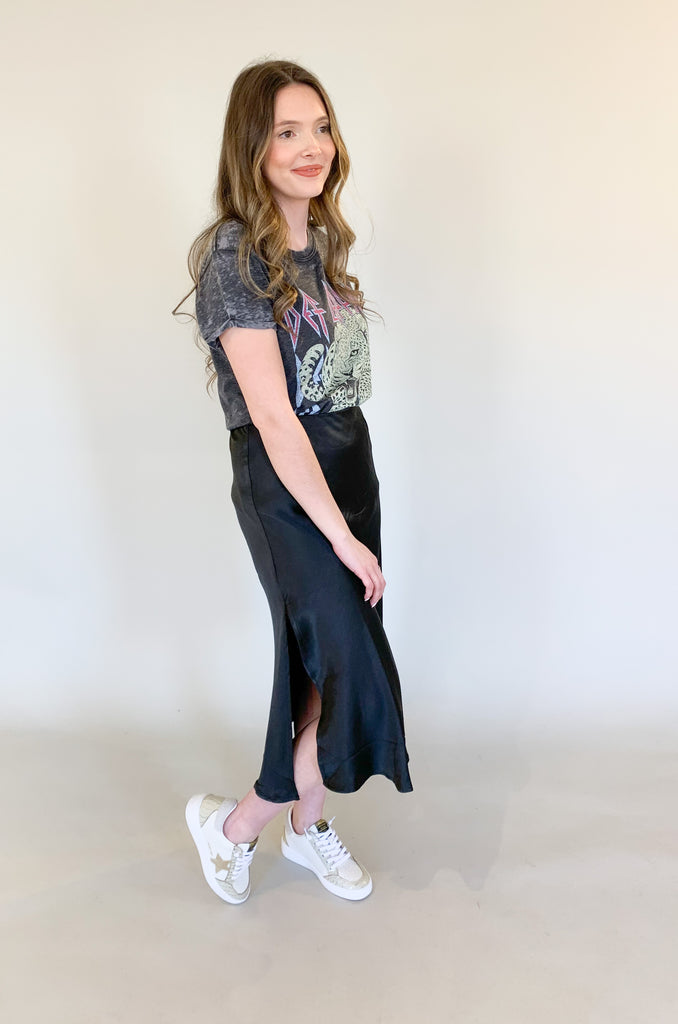 An elevated skirt here to dress up any look! You can wear this style to special events, church, date night, you name it. We styled it more casually with a fun graphic tee, either way it's a great option!