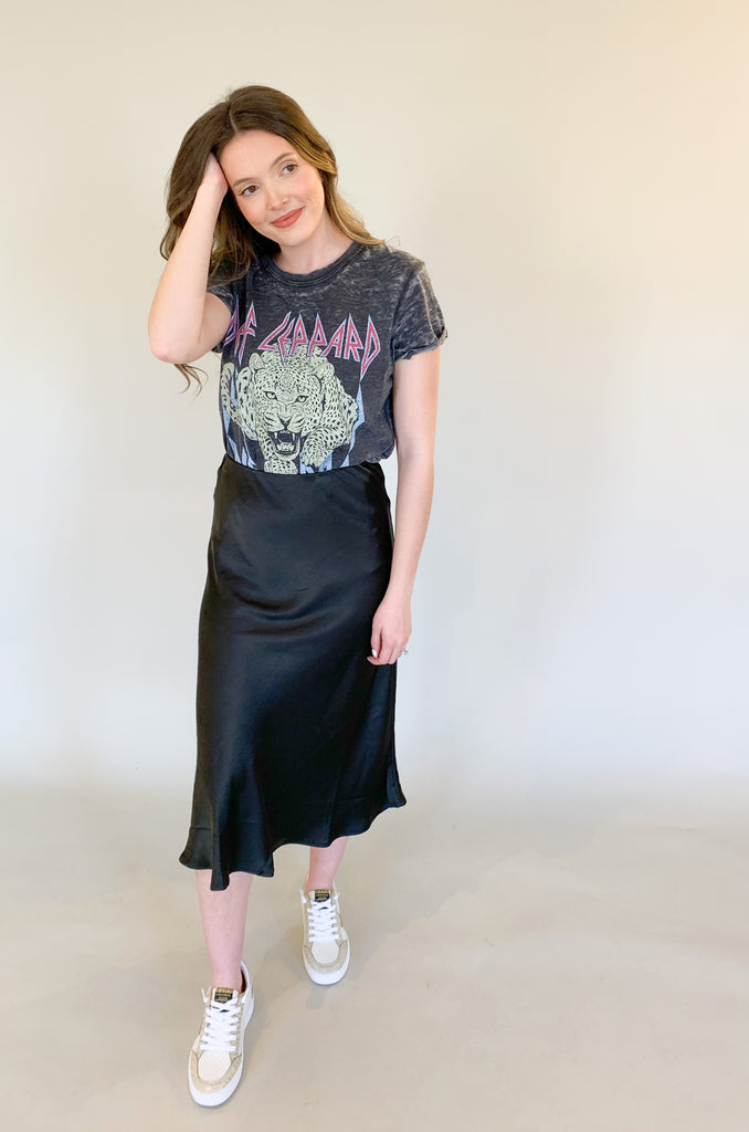 An elevated skirt here to dress up any look! You can wear this style to special events, church, date night, you name it. We styled it more casually with a fun graphic tee, either way it's a great option!