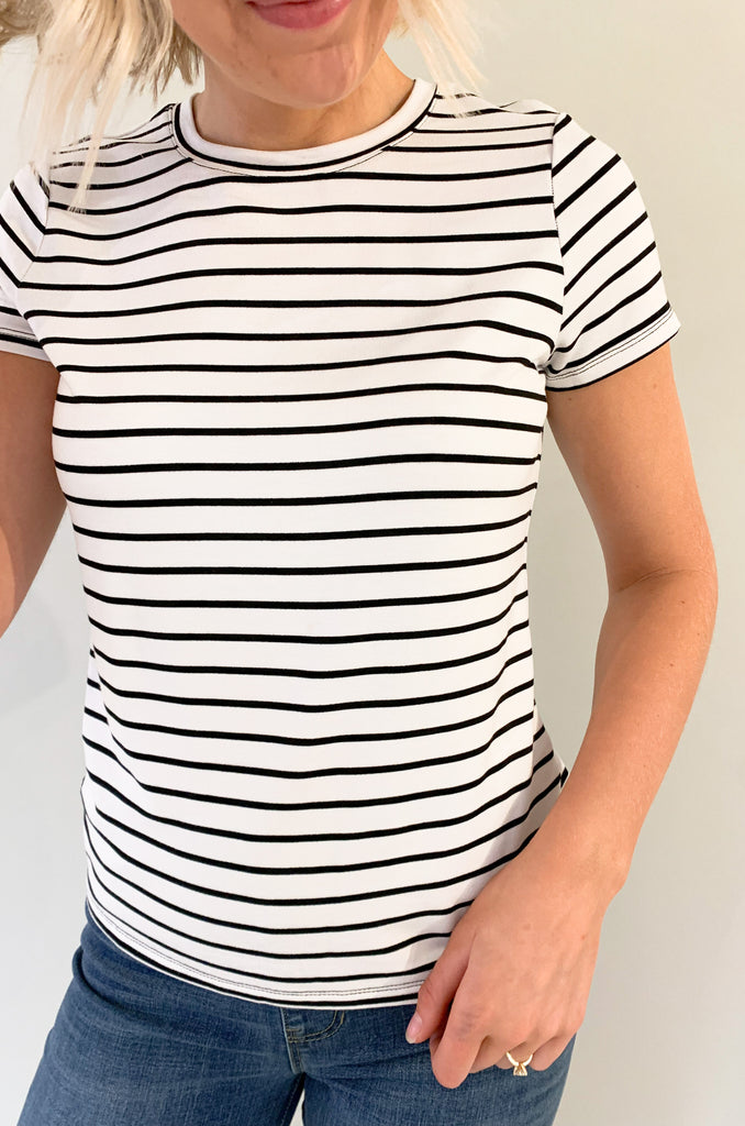 The Slim Fit Crew Neck Tee by Liverpool is a new favorite! It's soft, elevated, and perfect for on the go. The fabric feels like a literal dream. If you are looking for a staple shirt that you can dress up or down, this is it! Plus, the black and white stripe design is timeless. You can wear this style for years and it will still look fresh. 