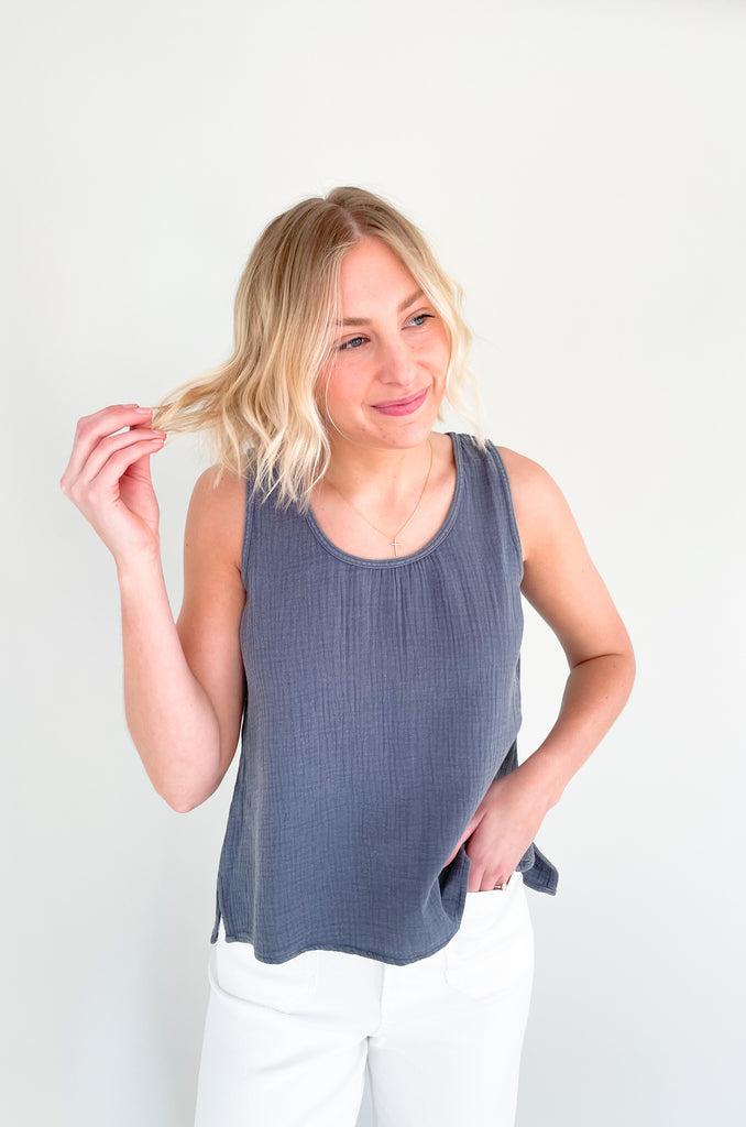 Meet the Still Here Side Slit Gauze Tank: a navy blue shirt made for everyday! With its semi-cropped fit and gauzy fabric, this tank will keep you looking fly and feelin' cool whether you're running errands or heading out for the evening. It's soft, elevated, and lightweight too! 