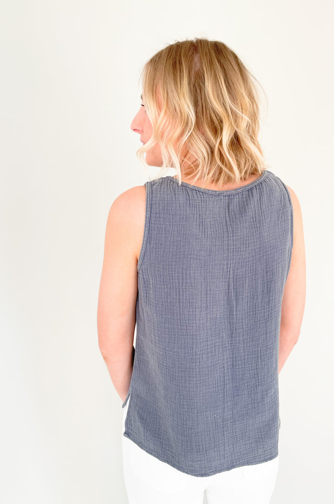 Meet the Still Here Side Slit Gauze Tank: a navy blue shirt made for everyday! With its semi-cropped fit and gauzy fabric, this tank will keep you looking fly and feelin' cool whether you're running errands or heading out for the evening. It's soft, elevated, and lightweight too! 