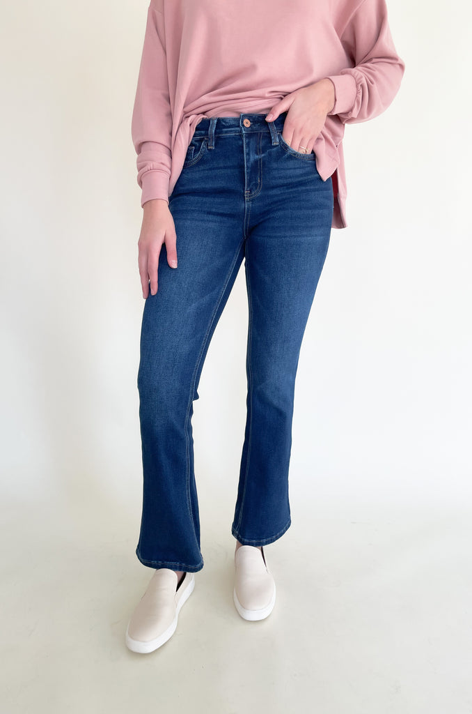The Vervet Sunny Dark Wash High Rise Boot Cut Denim is a great style for fall and winter! The color is a luxurious dark wash that looks sleek and timeless. They are extremely comfortable too and have a trendy, boot cut shape. You cannot go wrong with these! 
