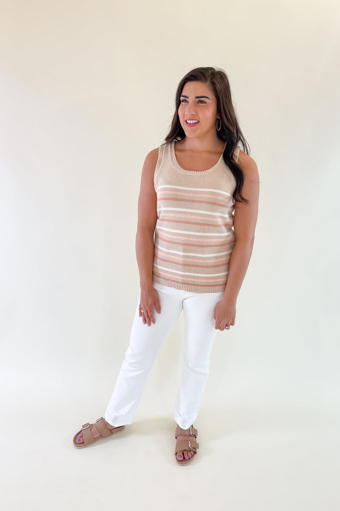 The Sunrise Striped Sweater Tank is elevated, chic and can be worn all year. Wear it on its own now, and layered under cardigans, or jackets in the fall. The colors are so pretty and versatile. We played into the neutral look and paired this top with our new Spotless High Rise Slim Straight Jeans. The weight bottoms look great with the tan and mauve stripes.