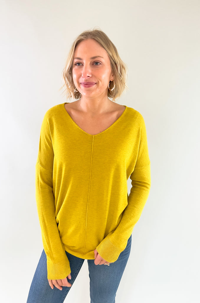 The Sweet Celina II V Neck Tunic is an amazing style by one of our favorite vendors, Dreamers. The fabric on these lightweight sweaters is so soft and dreamy! Plus, these special colors are perfect for the new season. The best part, you can wear them with leggings and still look good. 