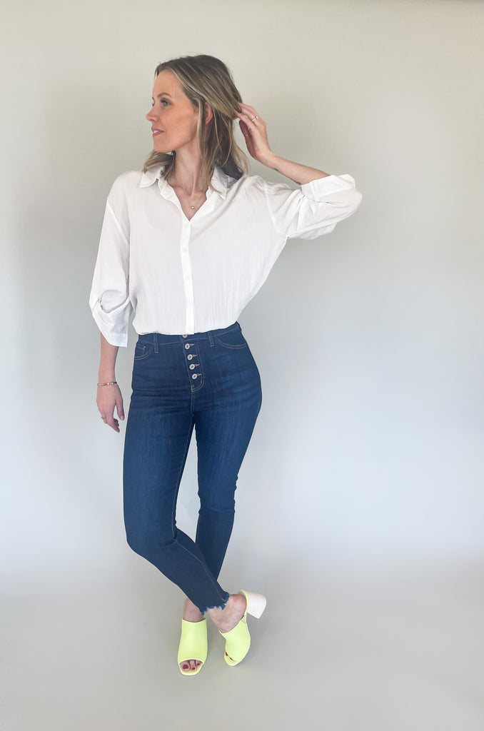 Elevated button ups are a hot trend this season, which is why we are absolutely loving the Tessa Texture Button Up Blouse. It comes in two amazing colors and has all of the details. This blouse is lightweight and comfortable, but also looks polished. 