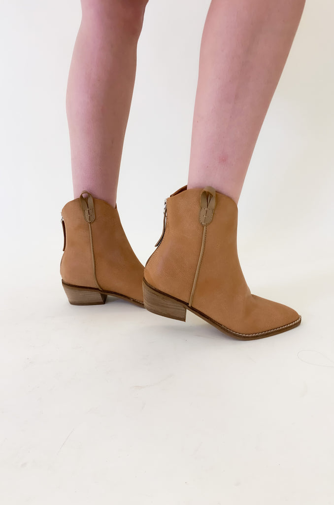 The Tina Camel Pointed Toe Faux Leather Booties are so fun. They are so chic and play well into the western trend we are seeing! These will effortlessly enhance your outfit and be a go-to for fall! Creamy nude colored boots 