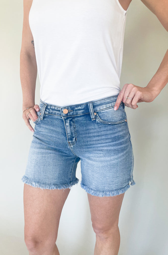 The Liverpool Los Angeles Vickie Fray Shorts might be one of the best pairs of shorts we have tried! The fit and quality is so nice, and there is a little bit of stretch for comfort. There's light distressing around the pockets and a frayed hem bottom. It looks trendy, but is very wearable. 