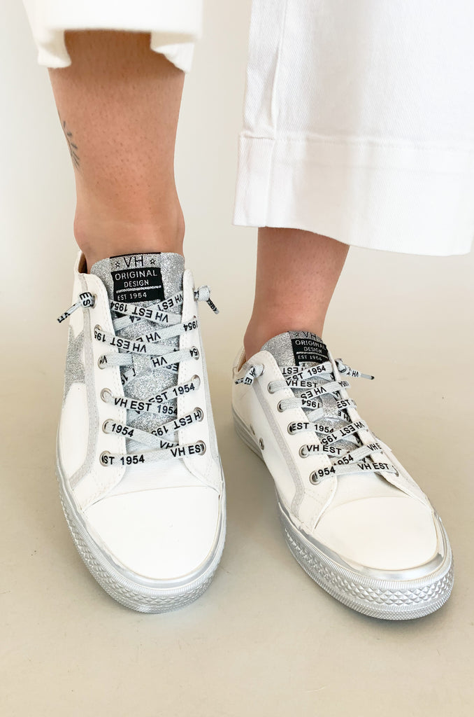 The Vintage Havana Alive Low Top Sneaker are a fun classic low top shoe with a retro feel. They add a little personality and sparkle to any outfit, but are still very wearable with the white and silver details. With a comfortable fit and elevated fabrication, these shoes a made for all day walking. 