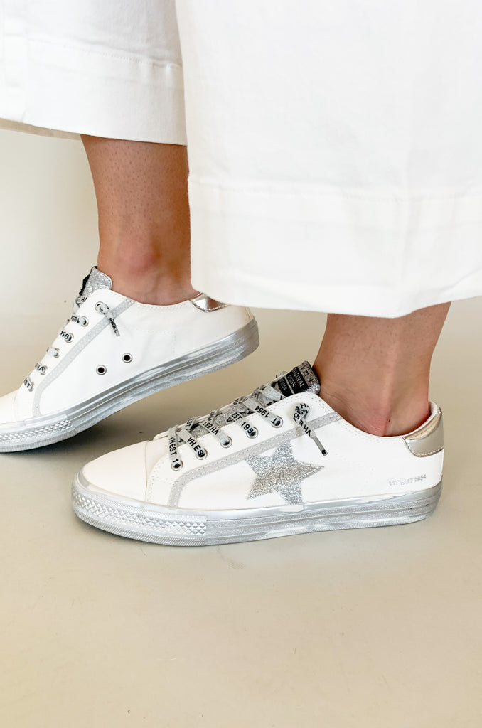 The Vintage Havana Alive Low Top Sneaker are a fun classic low top shoe with a retro feel. They add a little personality and sparkle to any outfit, but are still very wearable with the white and silver details. With a comfortable fit and elevated fabrication, these shoes a made for all day walking. 