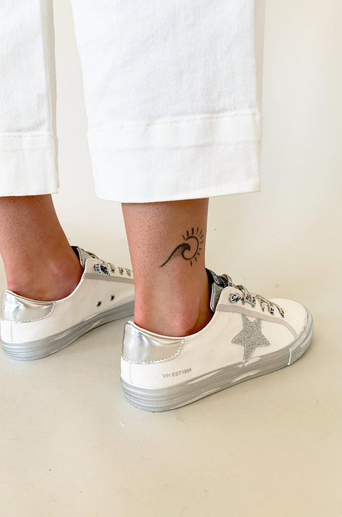 The Vintage Havana Alive Low Top Sneaker are a fun classic low top shoe with a retro feel. They add a little personality and sparkle to any outfit, but are still very wearable with the white and silver details. With a comfortable fit and elevated fabrication, these shoes a made for all day walking. 