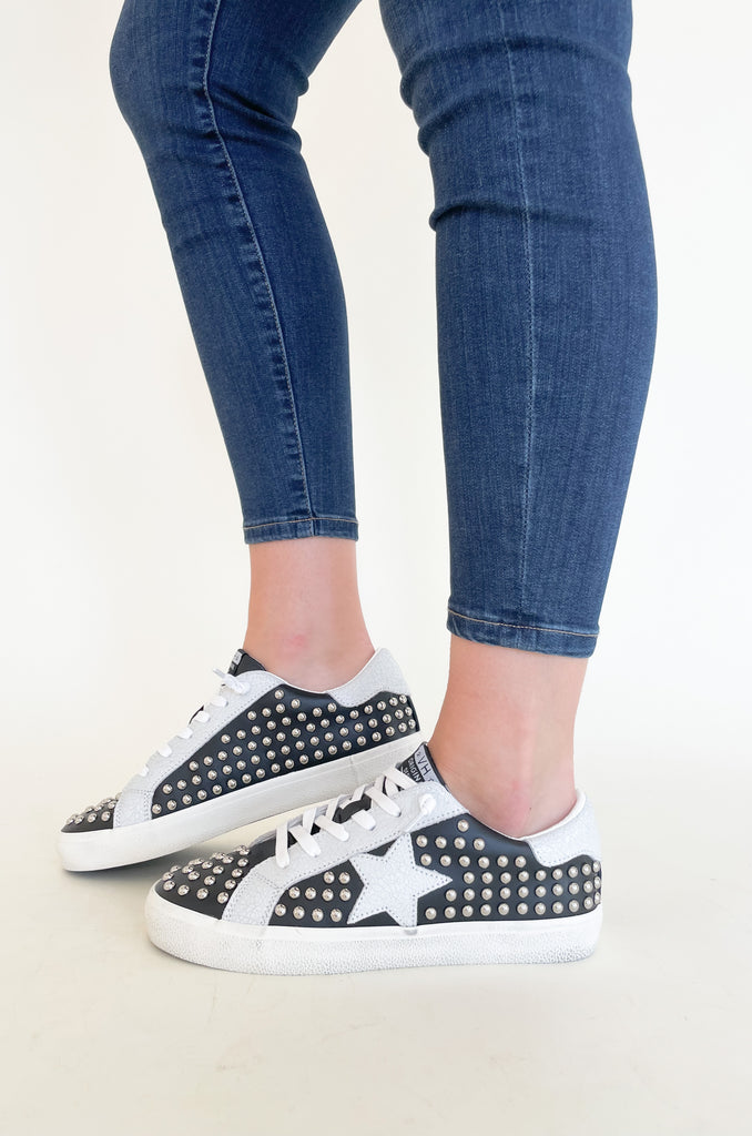 The Vintage Havana Angie Black Studded Sneaker is so unique! If you are someone who loves a standout piece, this is the style for you. It is all black leather with hints of speckled suede and metallic studs. The style is trendy and fun, but also very comfortable for on-the-go! It's by far a new favorite!