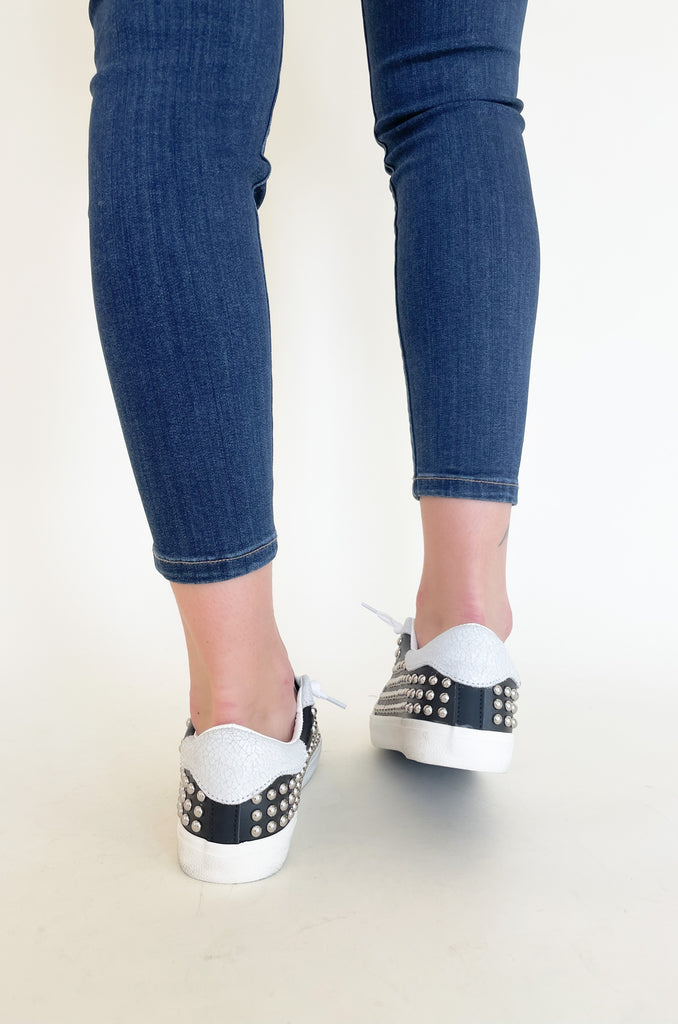 The Vintage Havana Angie Black Studded Sneaker is so unique! If you are someone who loves a standout piece, this is the style for you. It is all black leather with hints of speckled suede and metallic studs. The style is trendy and fun, but also very comfortable for on-the-go! It's by far a new favorite!