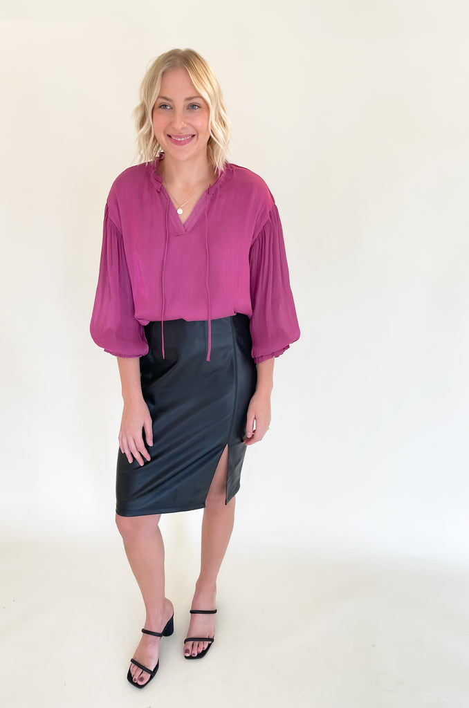 The Liverpool  black Pencil Skirt with 23.5" slit is so elevated and chic. This is the perfect work or date night skirt, and pairs beautifully with so many tops. We styled it with our new voluminous blouse for a fun look! 