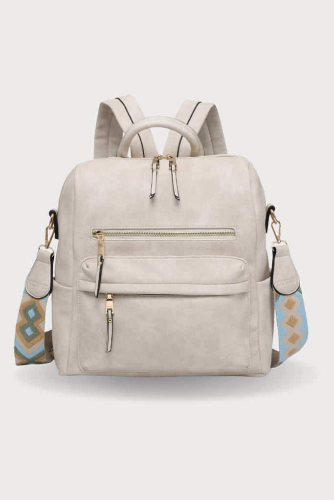 The Amelia Guitar Strap Back Pack is perfect for on-the-go! With multiple interior and exterior pockets, this bag is large enough to fit all the essentials, and more. The faux leather feels really soft and is great quality. The inside is quilted too. Each bag has the traditional faux leather adjustable straps, but also comes with an exclusive guitar strap.