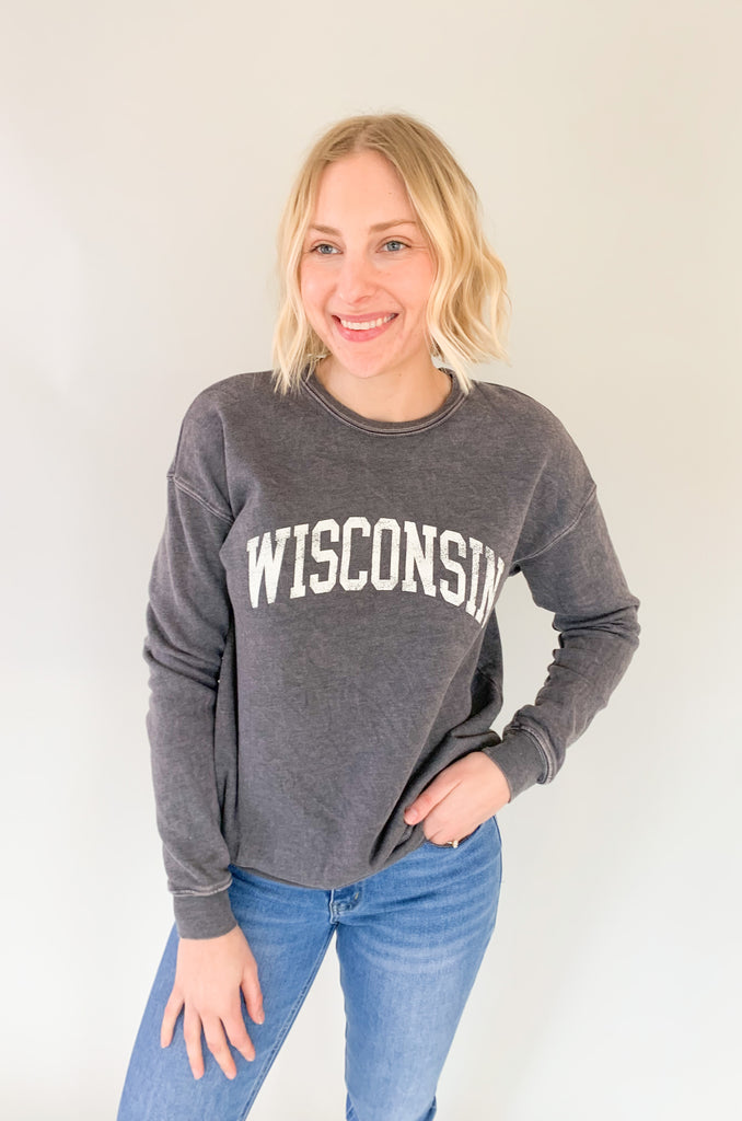 Wisconsin fans, get ready to fall in love with this dreamy pullover! It is so soft and cozy, perfect for weekends, game days, class, you name it. We are loving the unique mineral washed effect too. It makes each pullover slightly unique with a vintage feel. Choose between to cute colors!