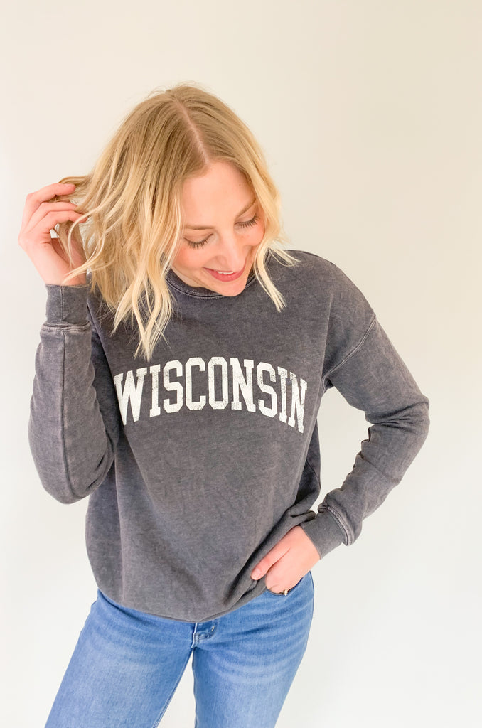 Wisconsin fans, get ready to fall in love with this dreamy pullover! It is so soft and cozy, perfect for weekends, game days, class, you name it. We are loving the unique mineral washed effect too. It makes each pullover slightly unique with a vintage feel. Choose between to cute colors!