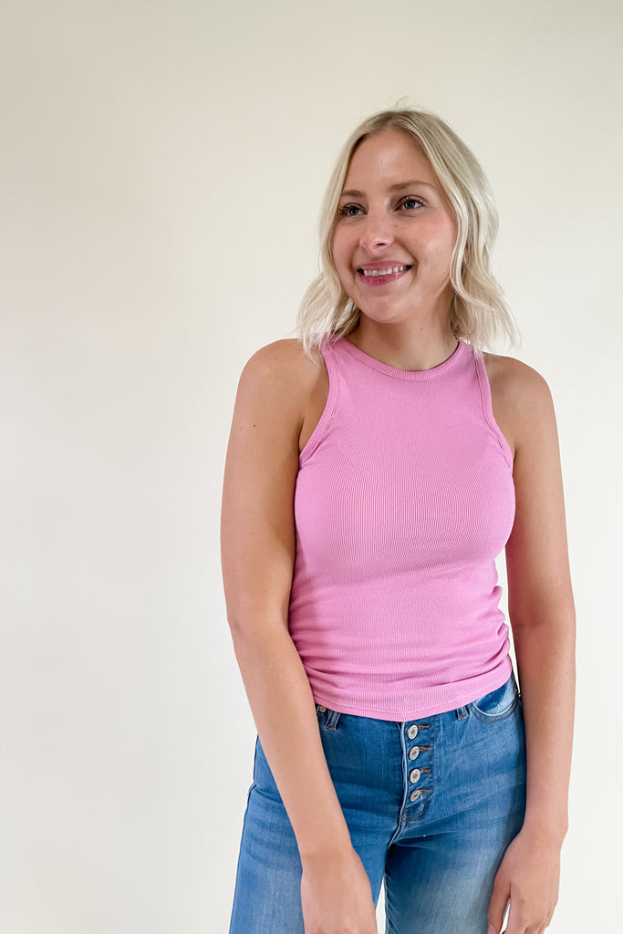 We love basics like the [Z SUPPLY] Janice High Neck Tank! This style comes in two colors: Orchid Pink and Black. You cannot go wrong with either, or both! The fabric is lightweight, comfortable, and very elevated. Pair it with our Raven Button Fly High Rise Destructed Hem Jeans, or our new [Z SUPPLY] Whitesands Wide Leg Pants. 