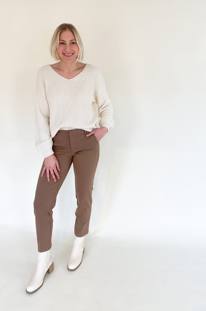 The [Z SUPPLY] Joni V Neck Pullover is a classic style that will transfer from season to season. The fabric is not too heavy and very comfortable. It looks so chic and timeless, especially when paired with our favorite Kelsey Knit Trousers.